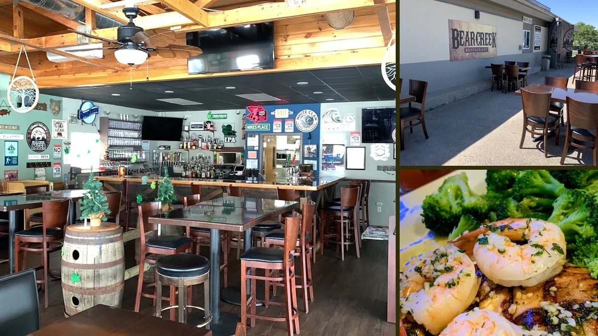 A local restaurant space with tables and a bar.